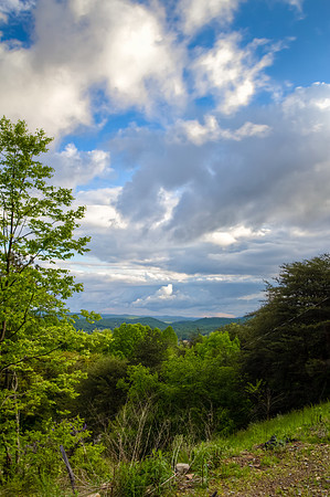 Mountain Landscape With Cloudy Blue Skies
