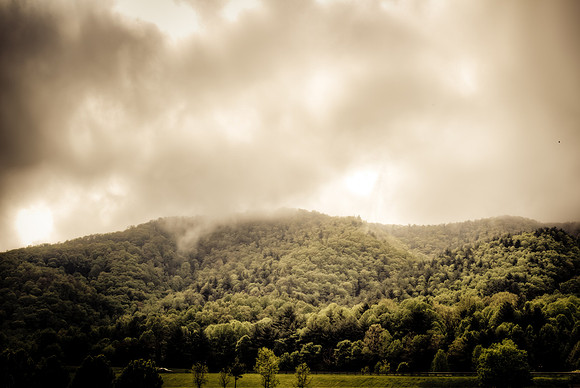 Mountain Mist Green Trees and Clouds